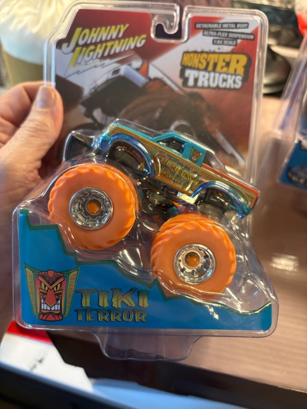 Johnny Lightning Tiki Terror Monster Truck - Teal & Gold with Orange Wheels